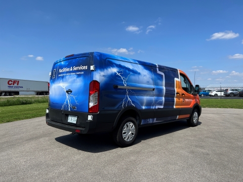 E-transit picture with the Illinois branding (Rear view)