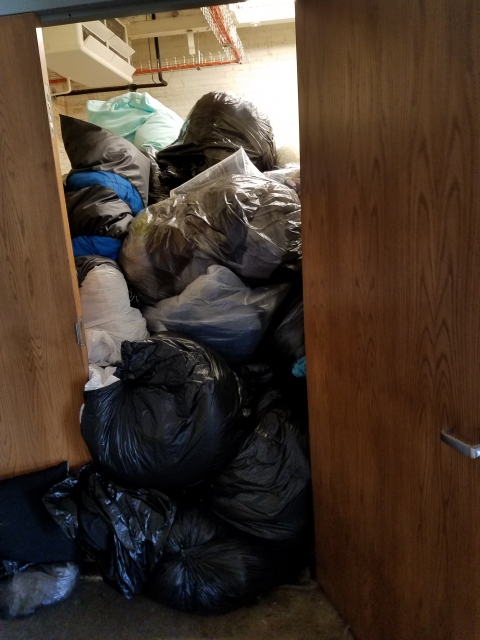 Garbage bags filled with items for Dump & Run